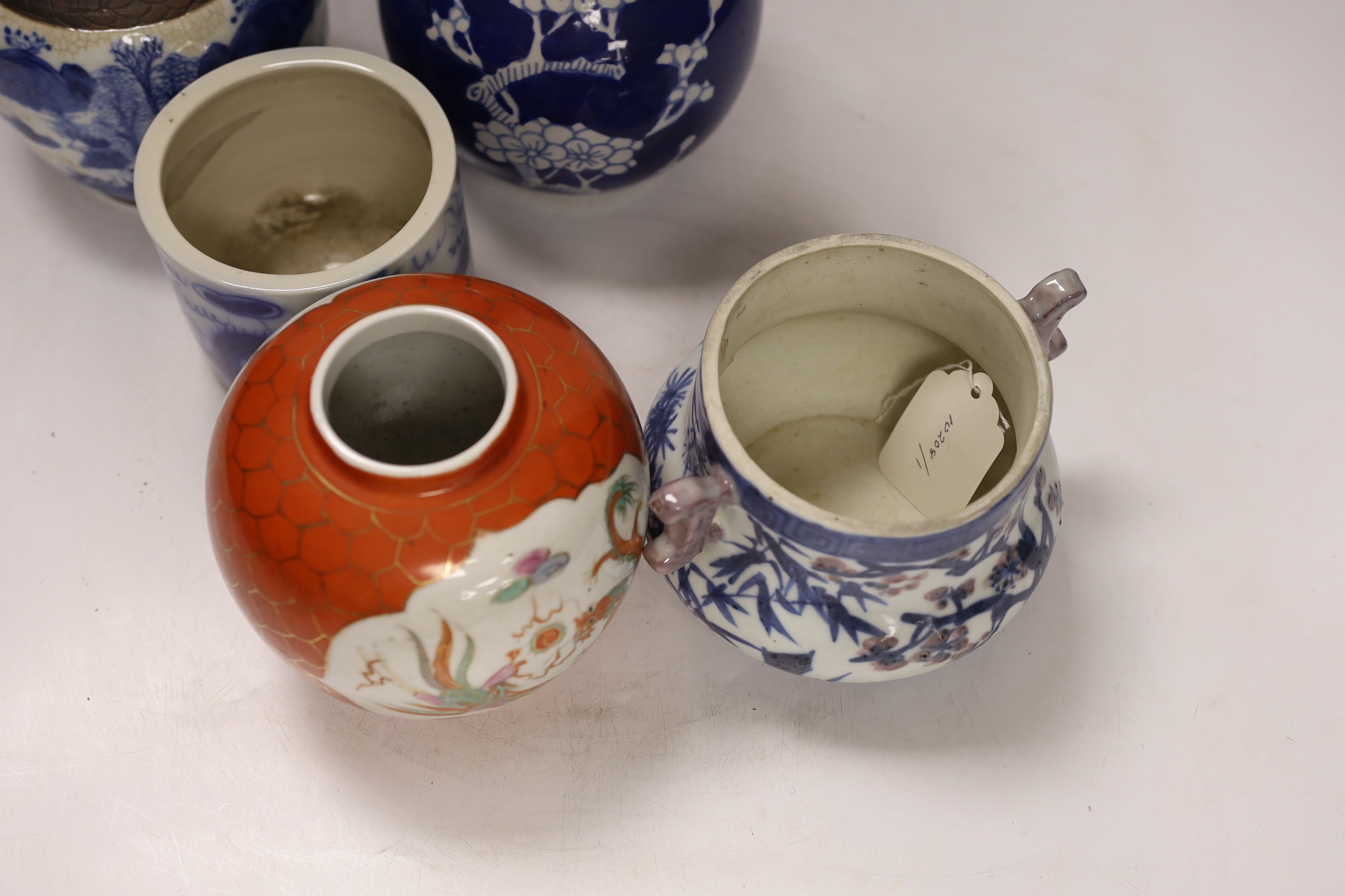 Two Chinese famille rose jars, a similar pot with cover, a brush pot and a vase, 18th century and later, tallest 24cm (5)